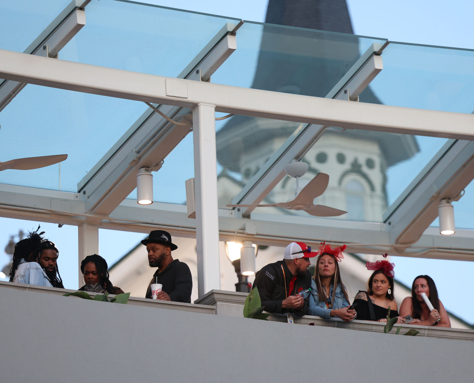 People look below at the paddock.JPG
